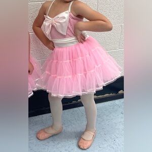 Pink and white dance costume